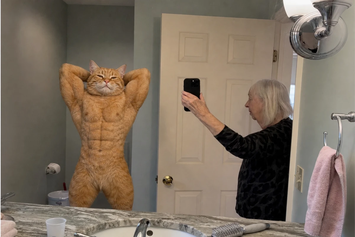 A flexing cat as a mog meme with Grandma taking the mirror pic